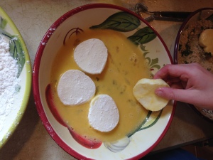 Dipping the mozzarella