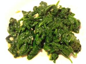 A full bag of fresh spinach, after 90 seconds of wilting